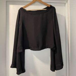 Free People Sheer Flute Sleeve Top in Black. Size L